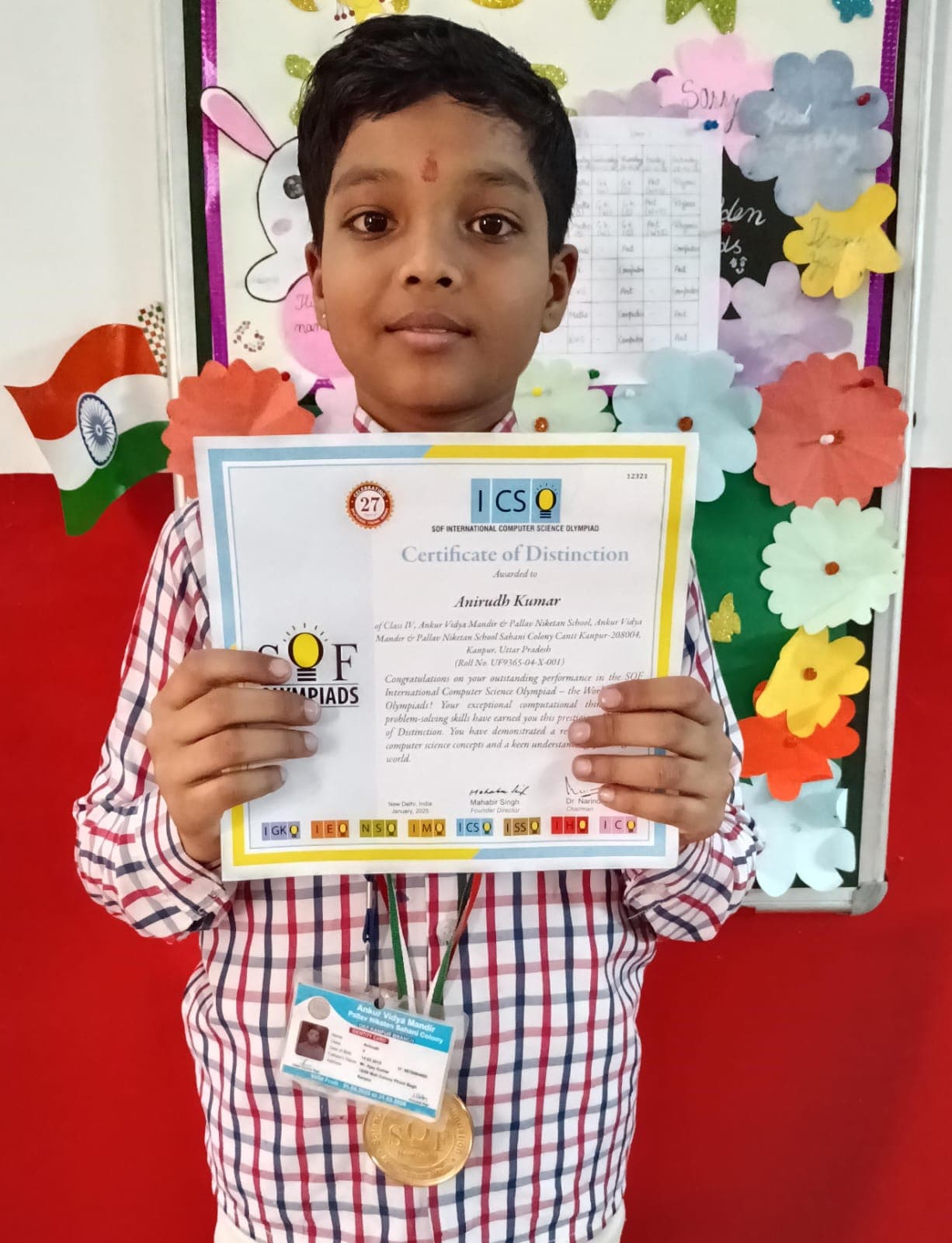 Anirudh Kumar with their SOF Olympiad medal and certificate