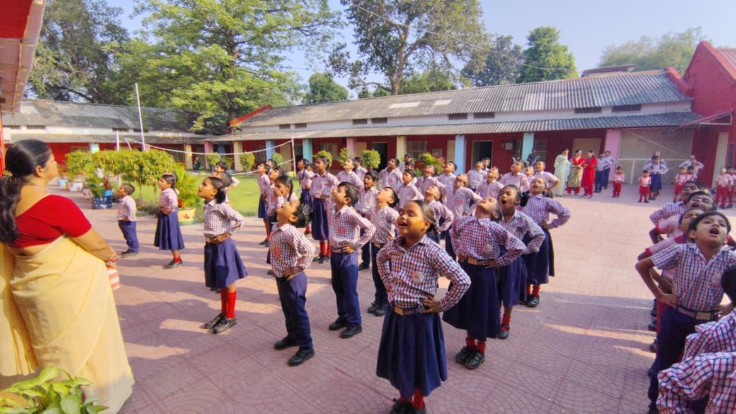 Morning assembly with students lined up in uniform