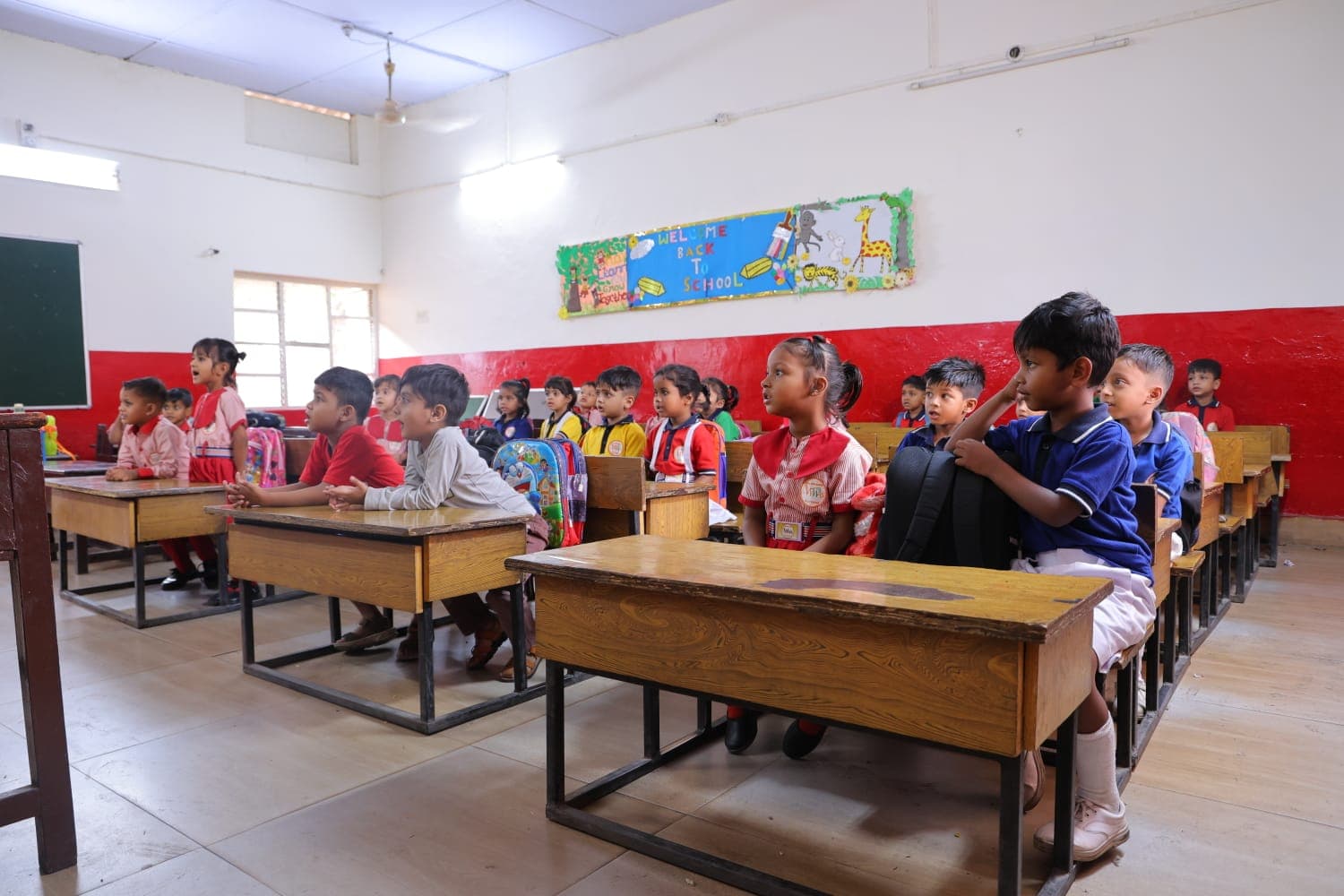 Pre-primary classroom with young children at desks