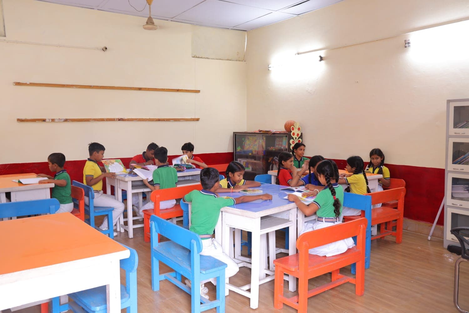 Children reading at the school library